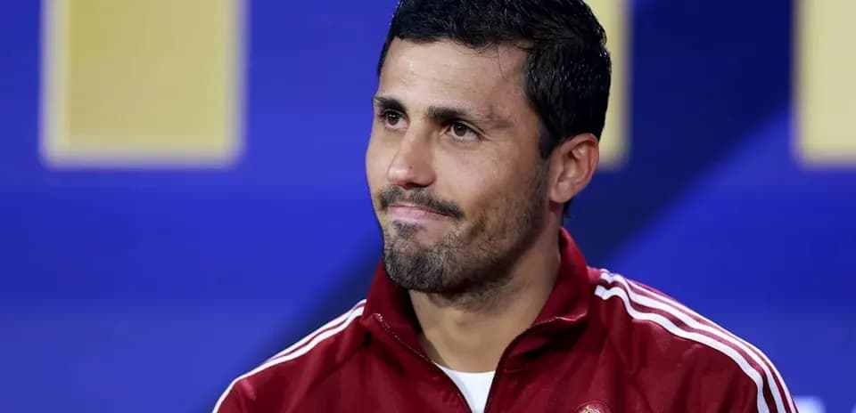 Player in Spain training gear during press conference
