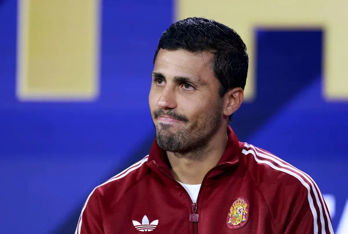 Player in Spain training gear during press conference
