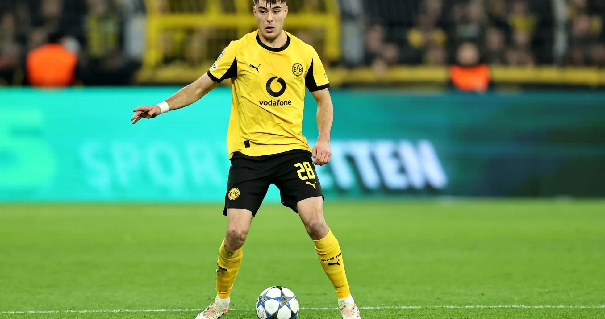 Player controlling the ball during Champions League match