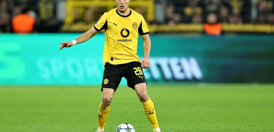 Player controlling the ball during Champions League match