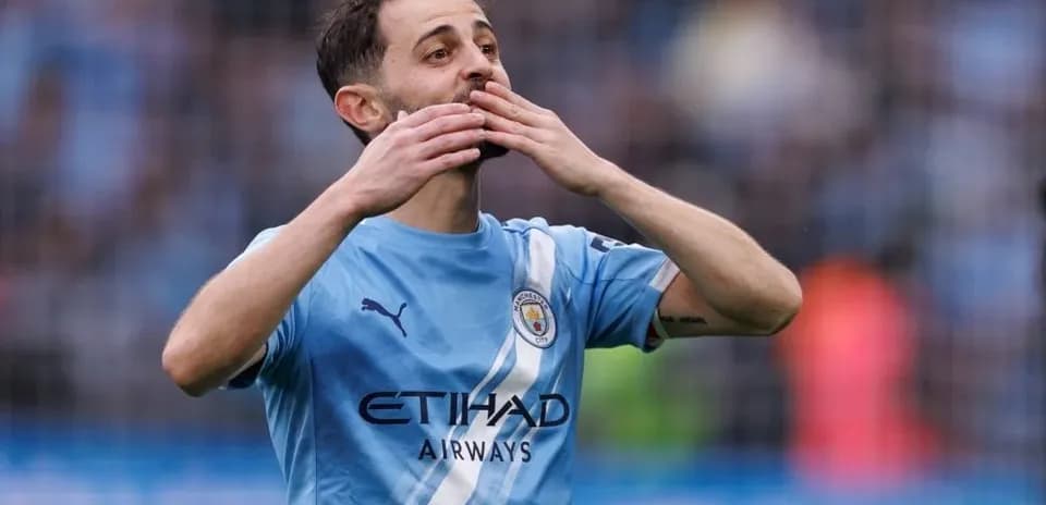 Player celebrating after scoring a goal for Manchester City