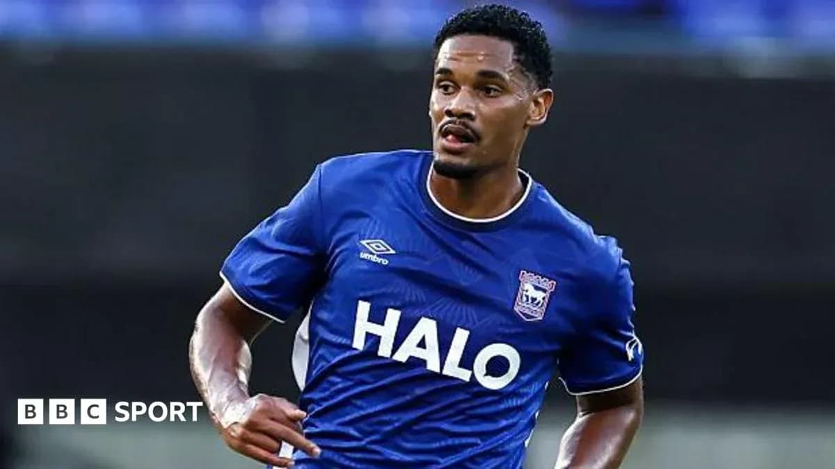 Player running in blue jersey during match