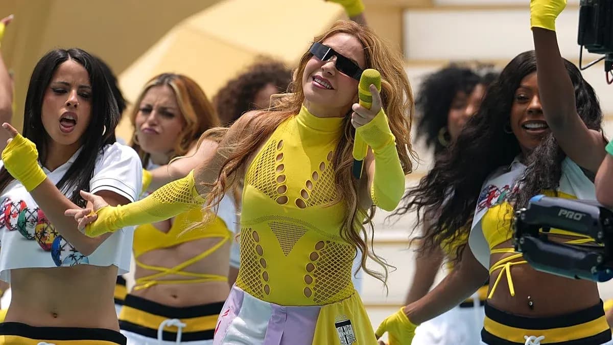 Performers dancing in colorful outfits during a performance