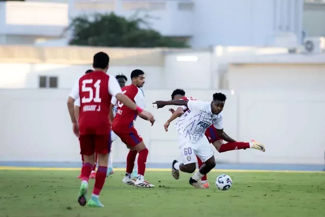 Al Ain U23 player dribbling past opponents