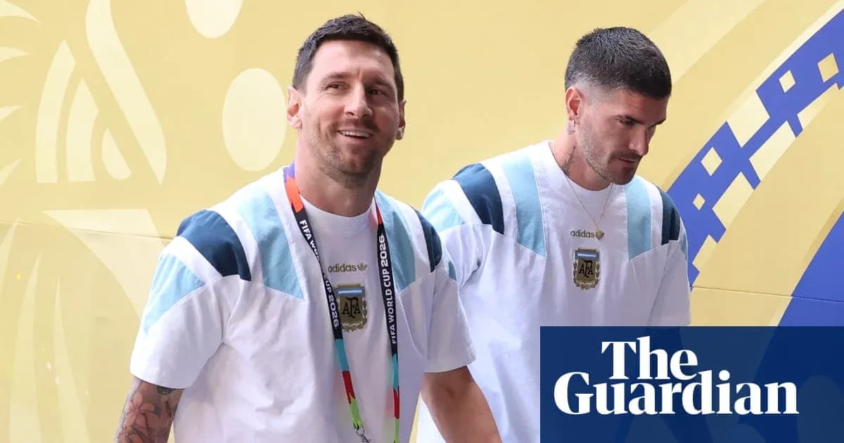 Two players walking with FIFA World Cup credentials
