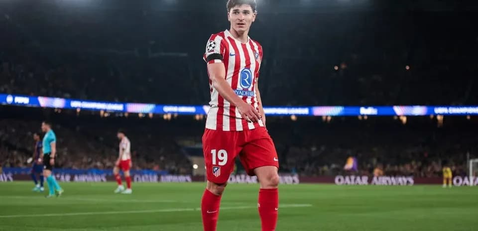 Atletico Madrid player on pitch during UEFA match
