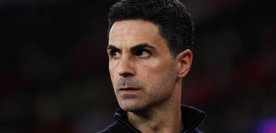 Football manager observing the match from sidelines