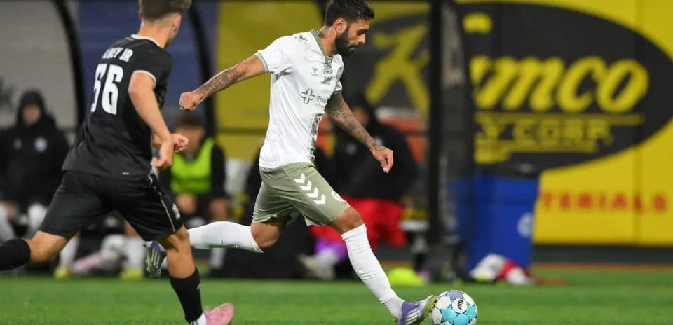 Player kicking ball during NY Cosmos match