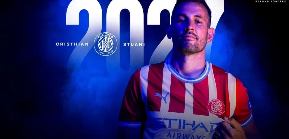 Cristian Stuani posing in Girona FC jersey