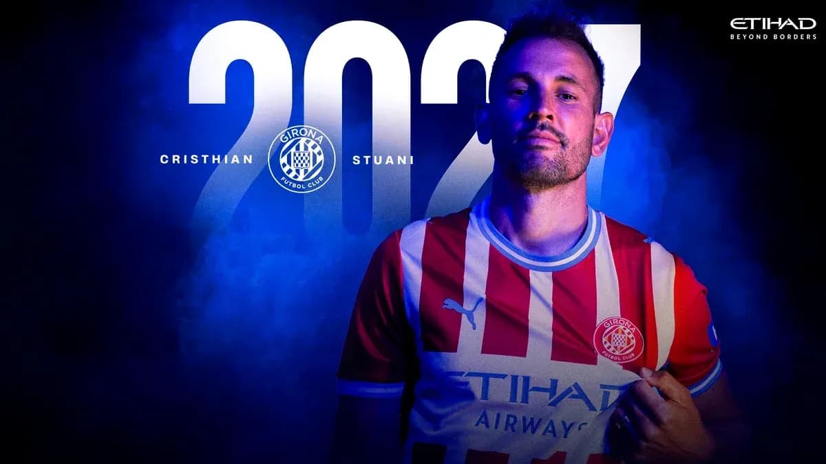 Cristian Stuani posing in Girona FC jersey