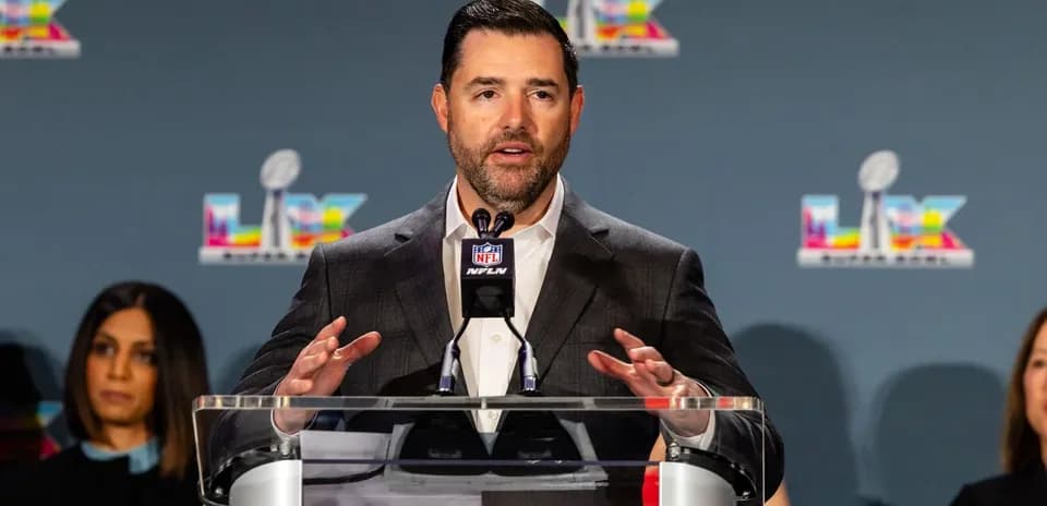 Speaker at NFL press conference with podium