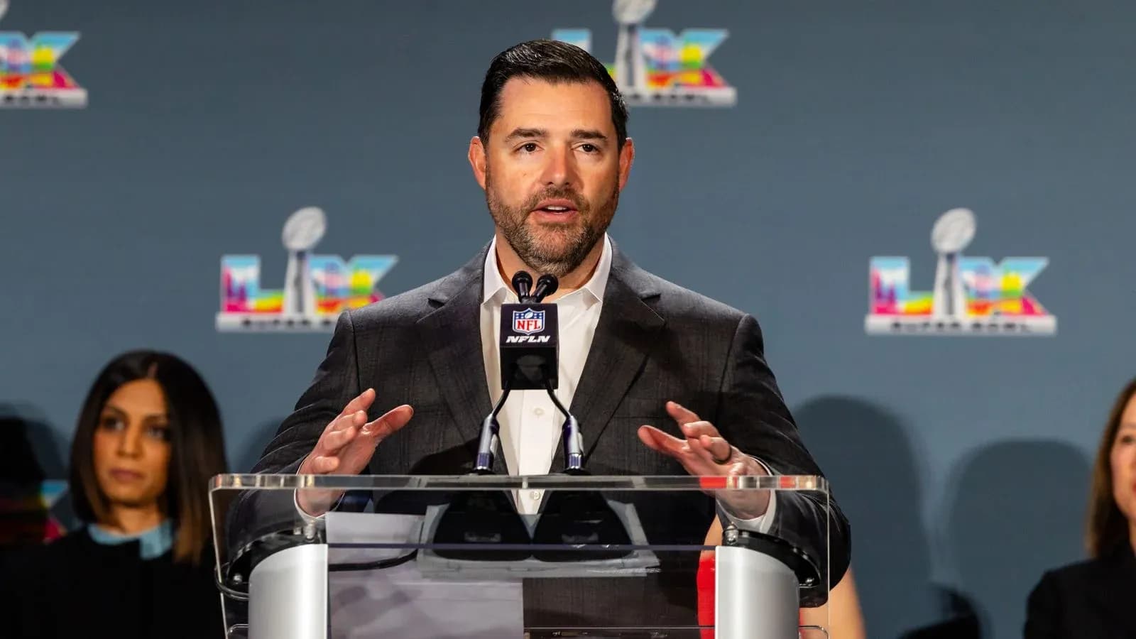 Speaker at NFL press conference with podium
