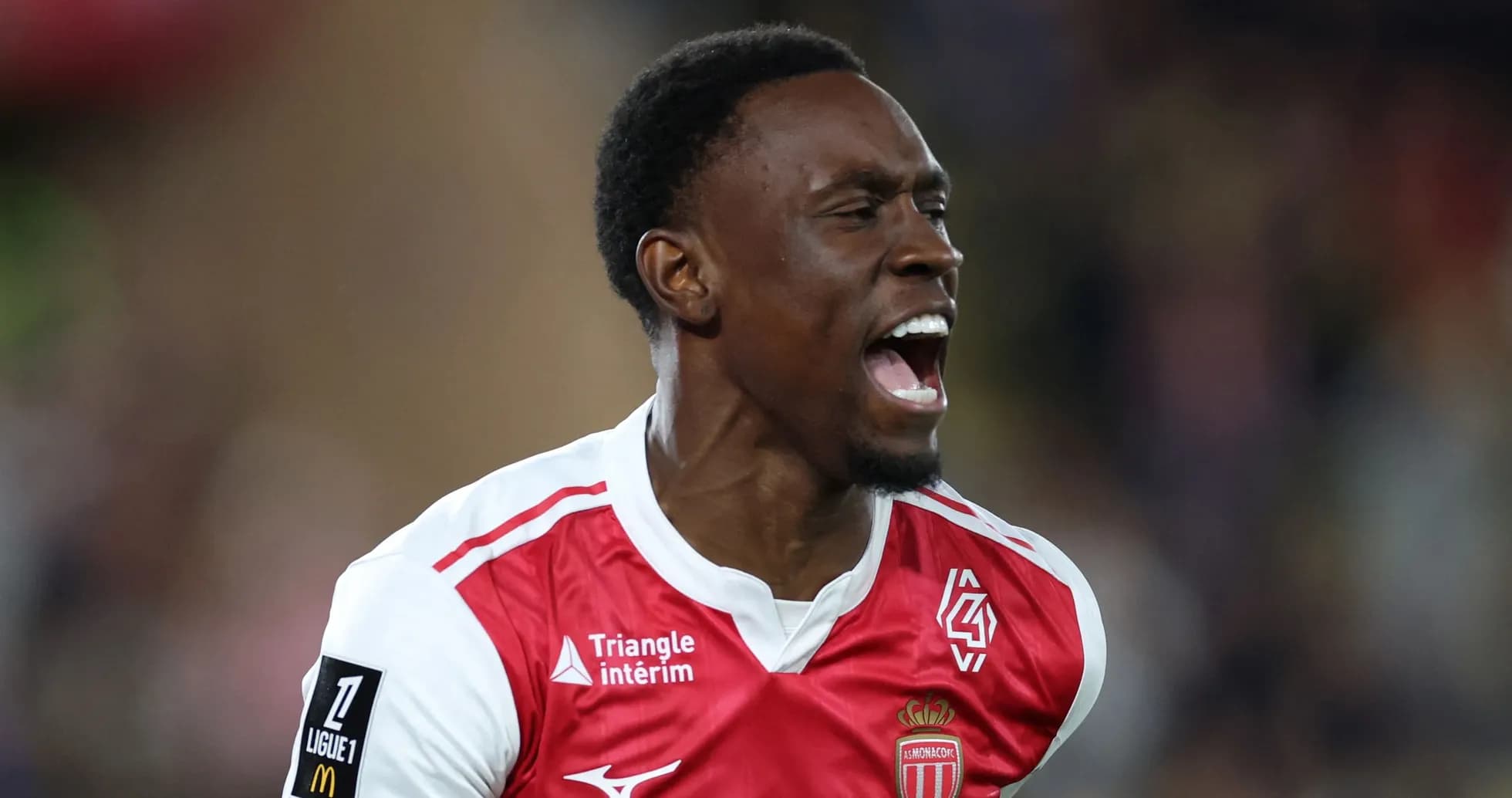Player celebrating after scoring a goal for Monaco