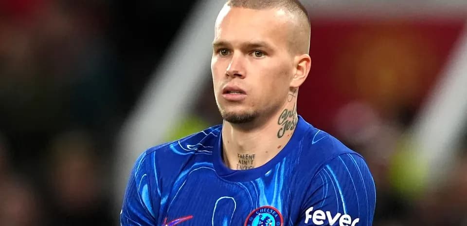 Player wearing Chelsea kit during match