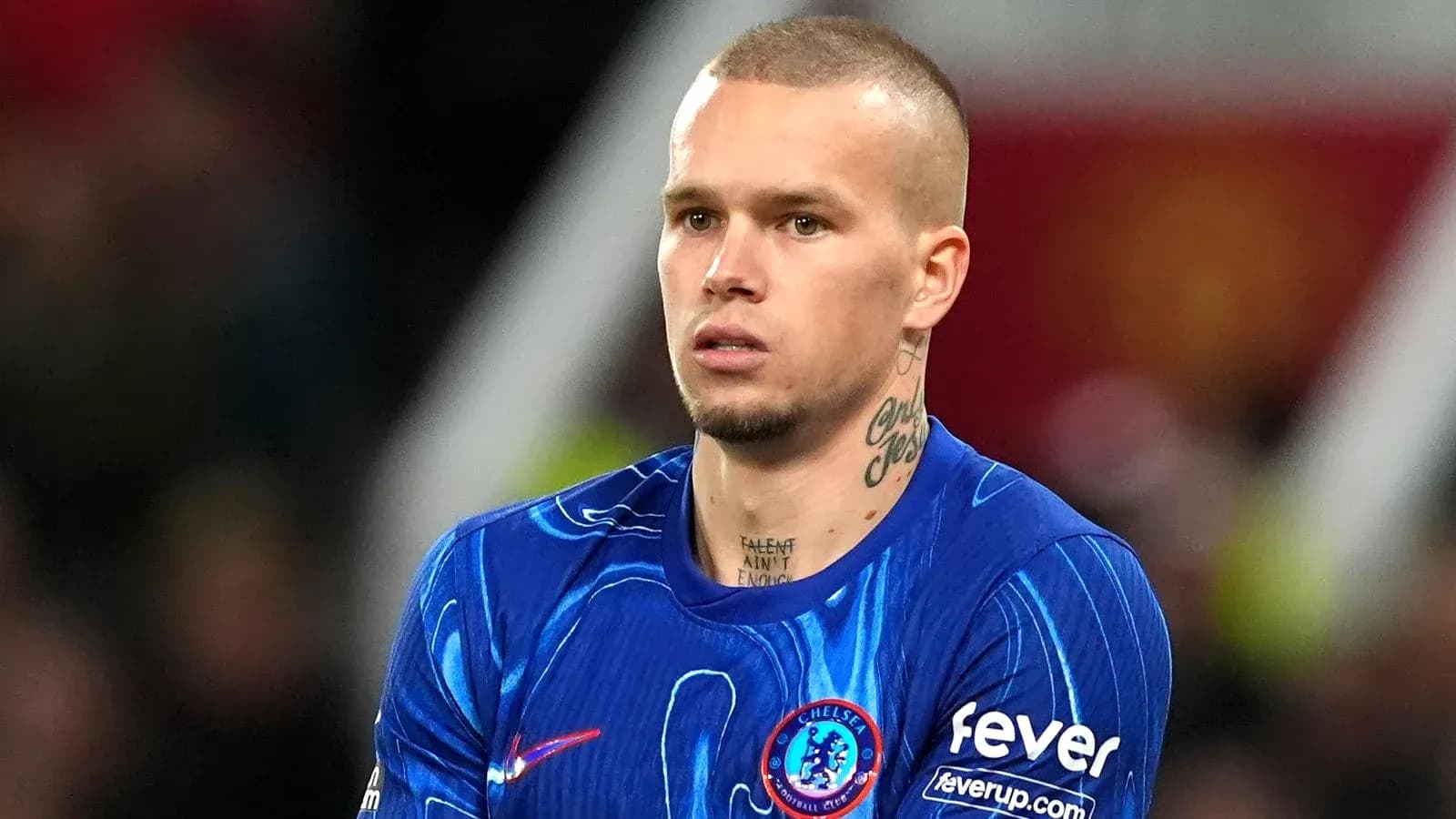 Player wearing Chelsea kit during match