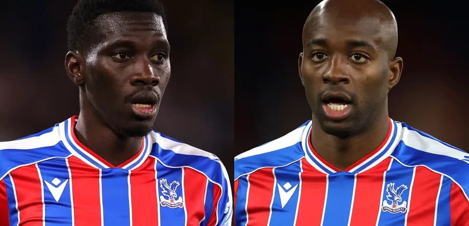 Two Crystal Palace players in match jerseys