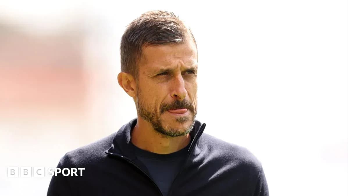 Coach looking thoughtful during training session
