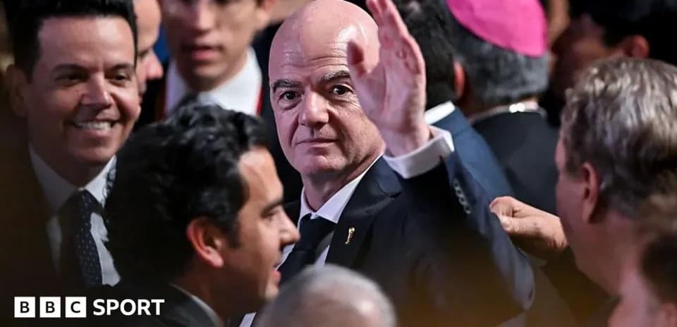 Man waving at a crowded event with attendees