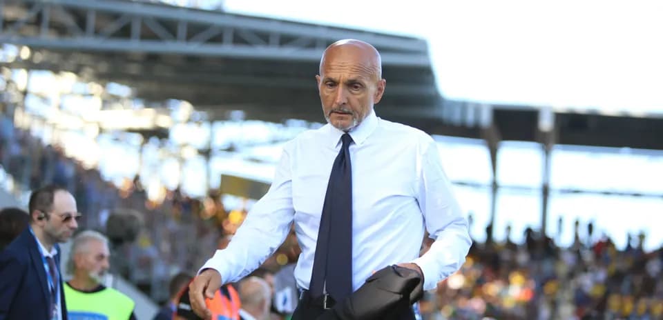 Coach walking on the sideline during a match