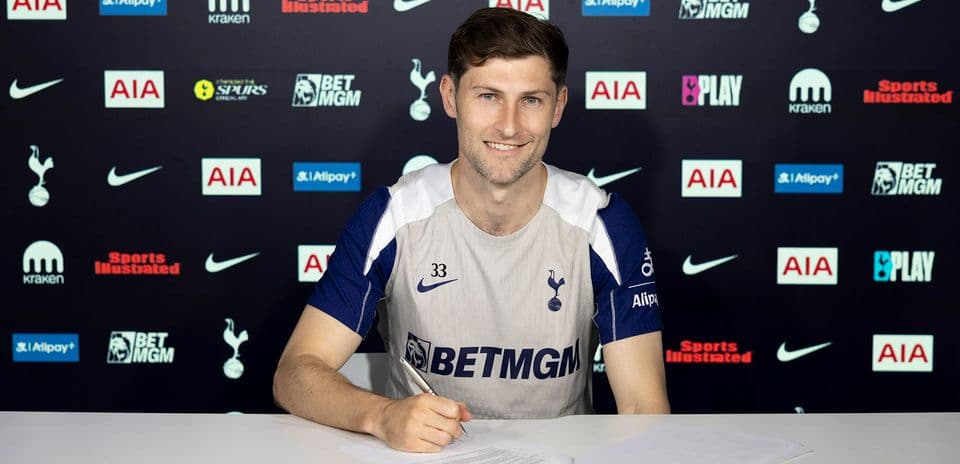 Player signing contract at Tottenham Hotspur press conference