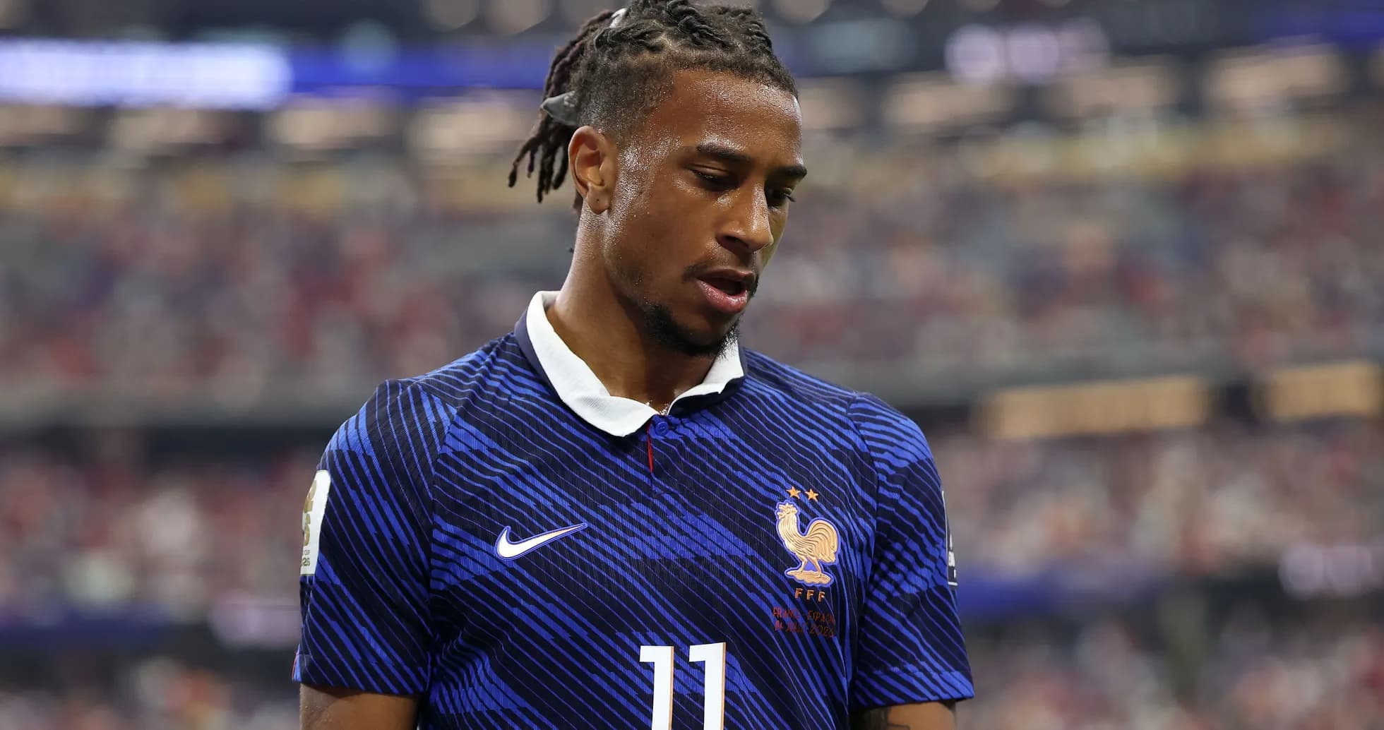 Player in France jersey during match action