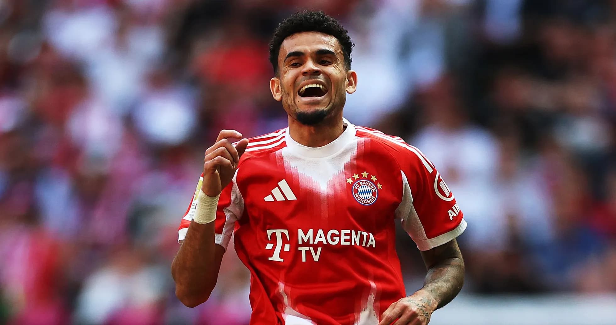 Player celebrating a goal in Bayern Munich jersey