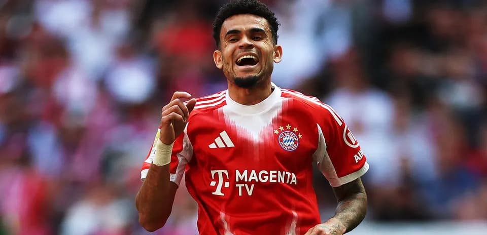 Player celebrating a goal in Bayern Munich jersey