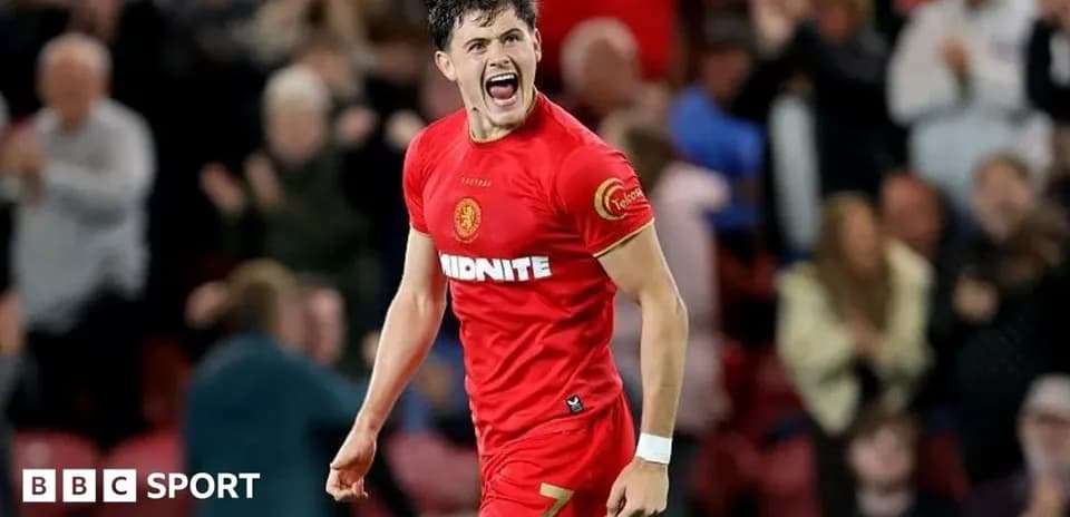 Player celebrating enthusiastically after scoring a goal
