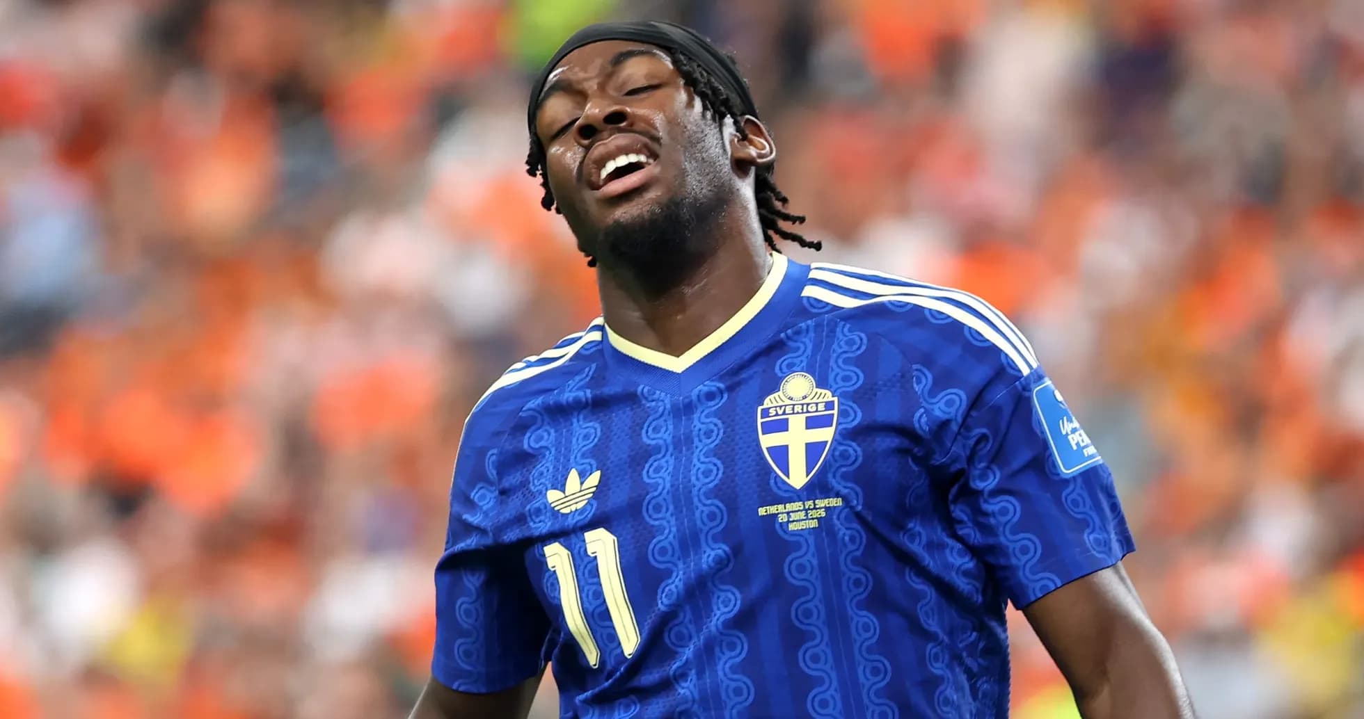 Player in blue jersey reacting during match