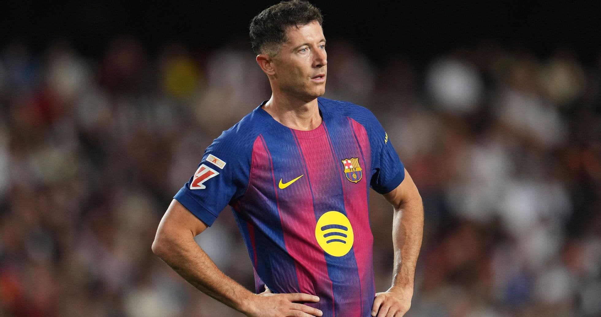 Player in FC Barcelona jersey on the field