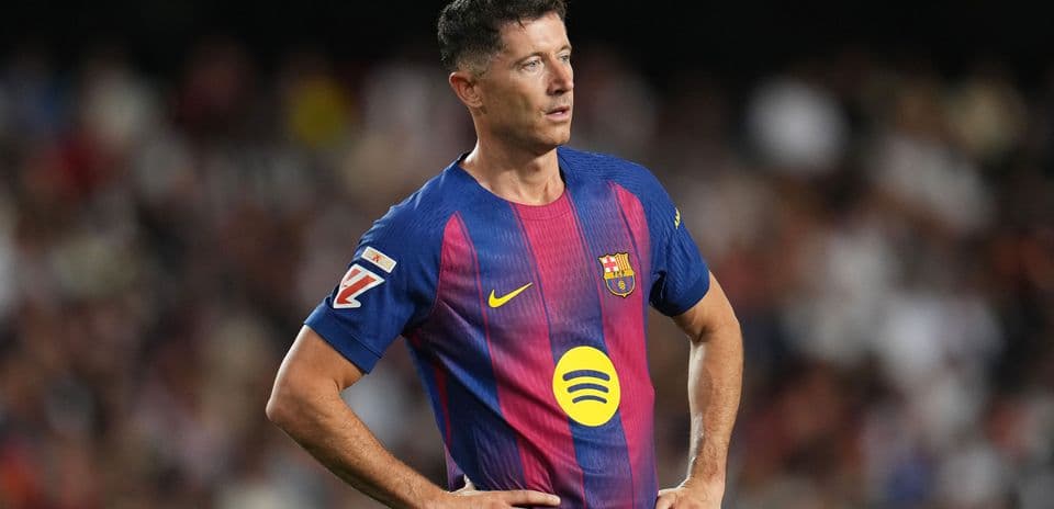 Player in FC Barcelona jersey on the field