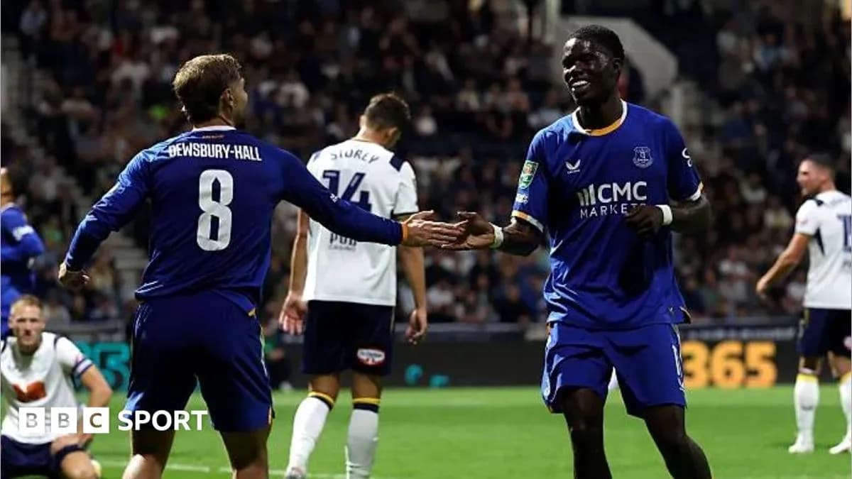 Players celebrating a goal during a match