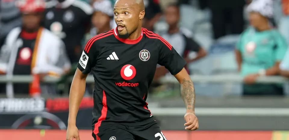 Player in black jersey during a football match