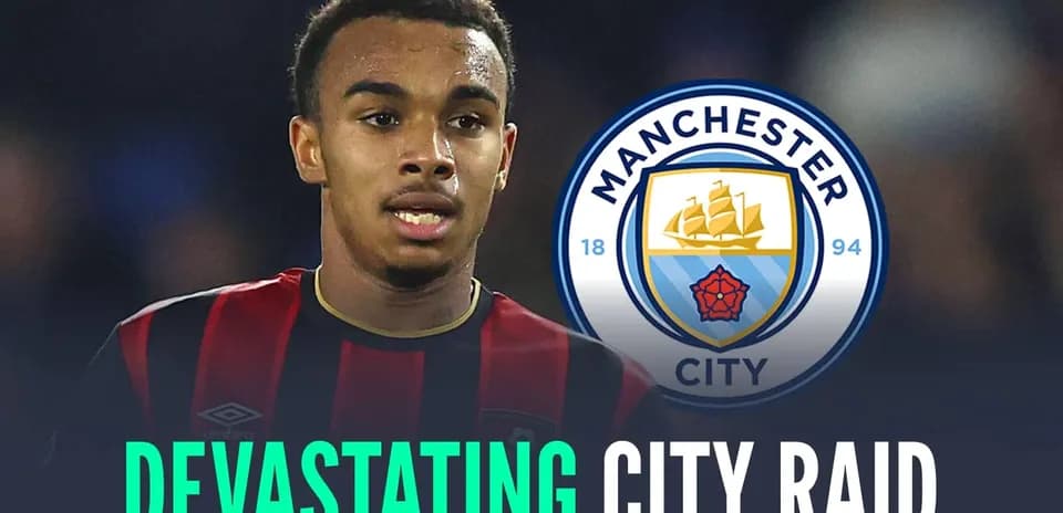 Player in jersey with Manchester City logo background