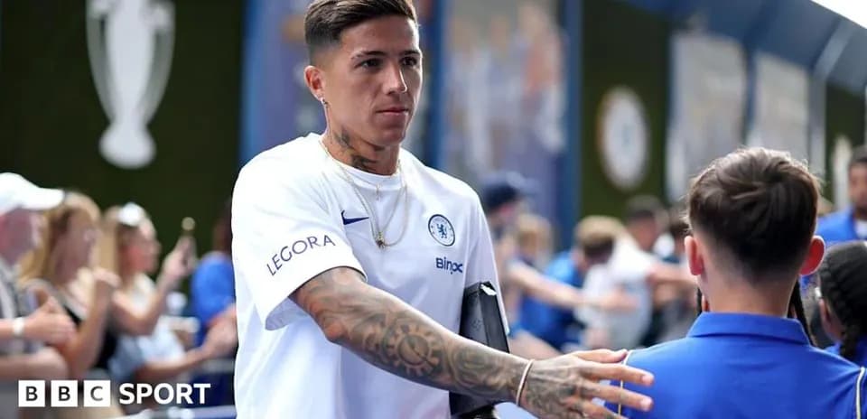 Player greeting young fan at Chelsea event