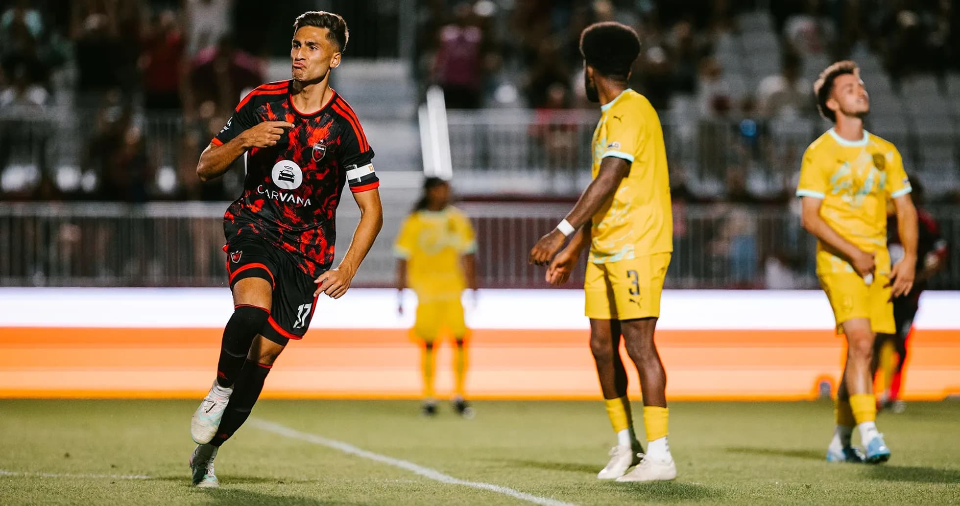 Player celebrating a goal during New Mexico United match