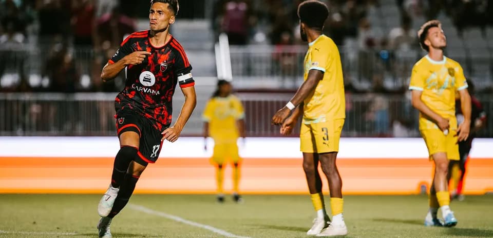 Player celebrating a goal during New Mexico United match