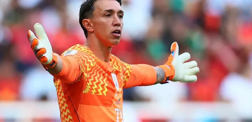 Goalkeeper directing play during a soccer match