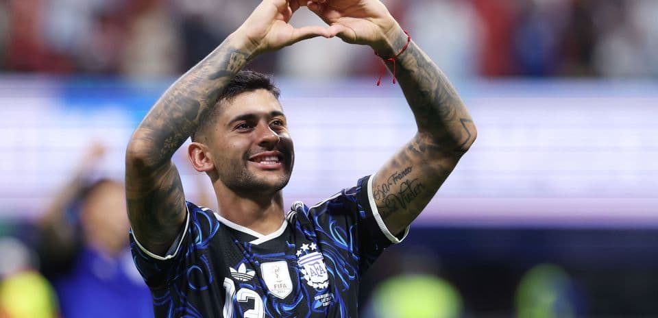 Player celebrating and making heart gesture after match