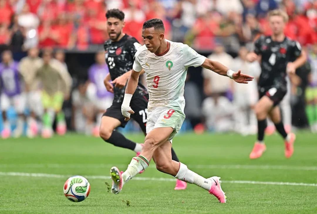 Moroccan player striking the ball during match