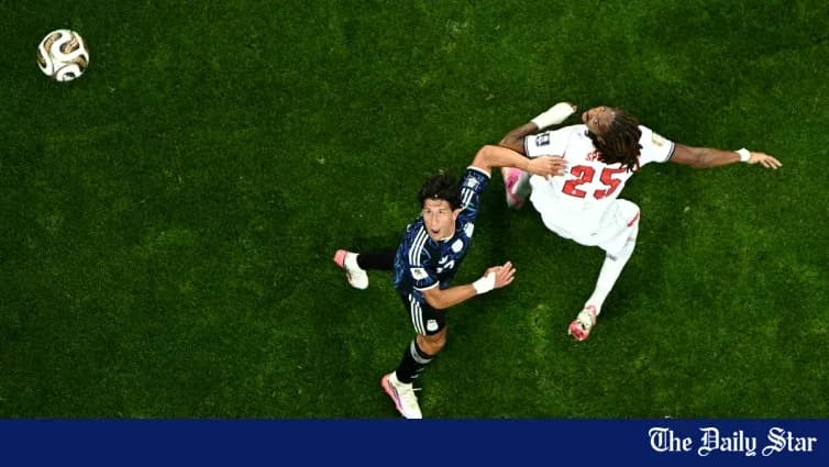Player dribbling while opponent falls on field