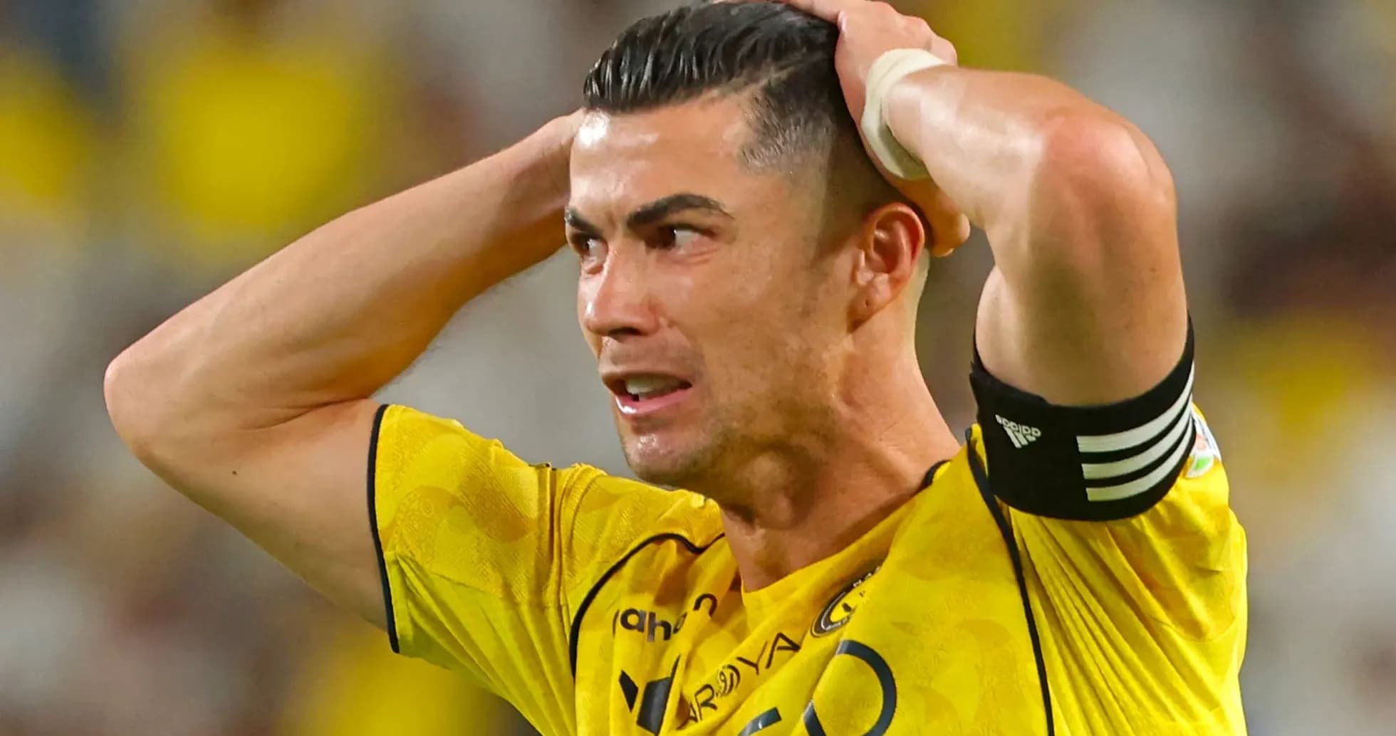 Player in yellow jersey reacting during match
