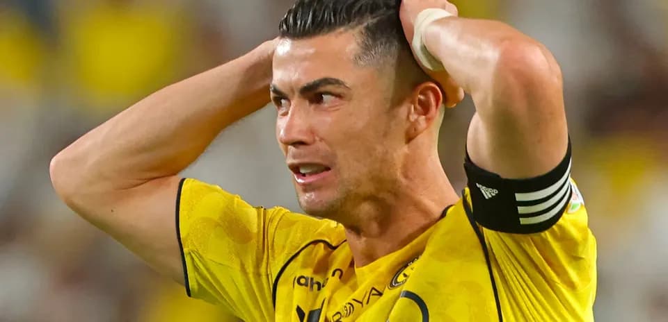 Player in yellow jersey reacting during match