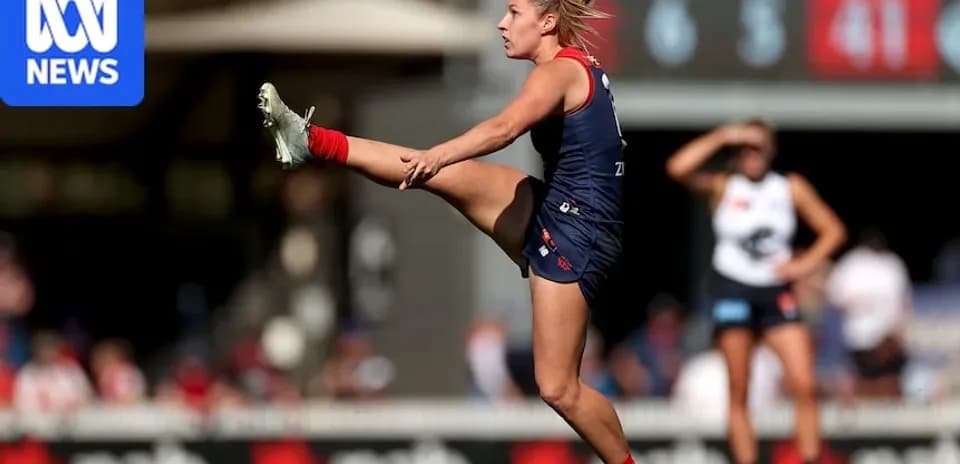 Player kicking the ball during a football match