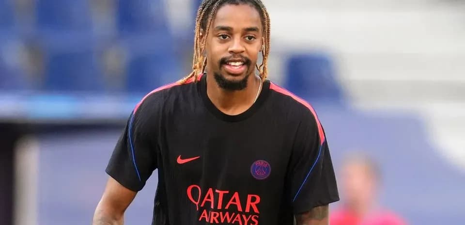 Player wearing PSG training kit during warm-up
