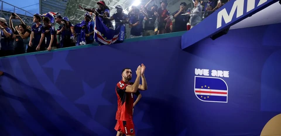 Player applauding fans after the match in stadium