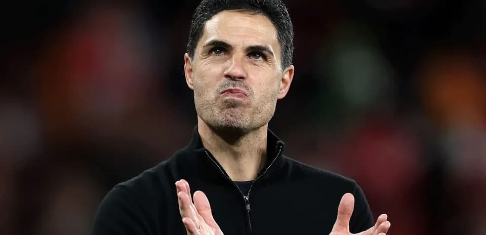 Manager clapping during match celebration