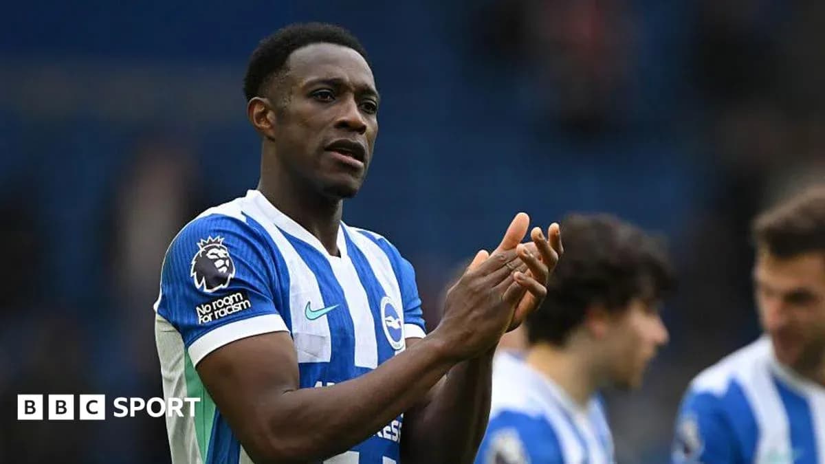 Player applauding fans after match at stadium