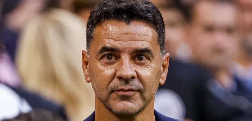 Coach looking on during a sporting event