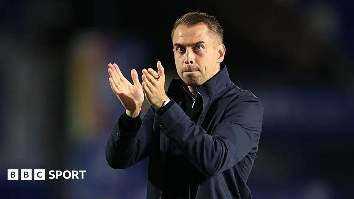 Coach applauding during a match celebration